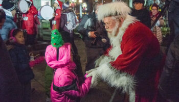 Santa Claus Greets Children At Downtown New Bedford's Holiday Stroll